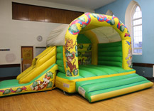 Yellow and Green Jungle Theme Bouncing Castle Cork City